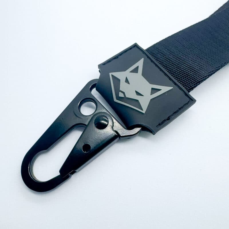 Black premium lanyard with a metal hook and a custom moulded rubber logo patch